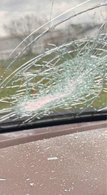 My windshield they damaged from a brick that came off their truck.