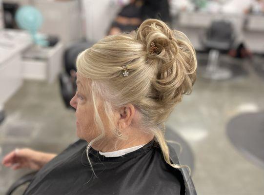 Updo for wedding. Client wanted butterfly clips.