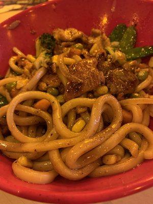 Stir-fried udon with beef, chicken, and vegetables