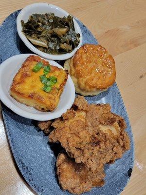 Fried chicken (dark meat), biscuit, mac and cheese, and collard greens.