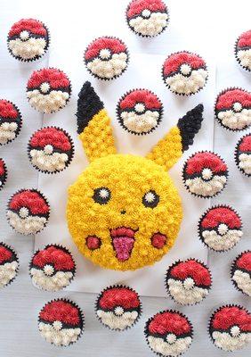 Pikachu cake and Pokeball cupcakes