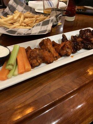 Buffalo and ginger soy wings with fries