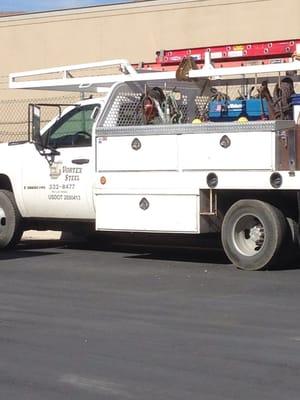 Welding truck in their parking lot.