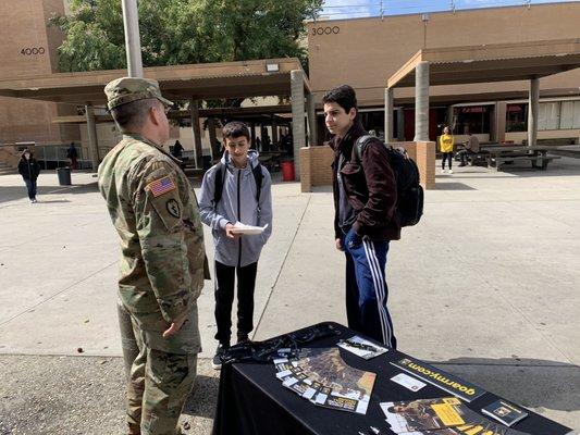 Helping answer questions about the Army and giving out free stuff to students of all ages. (Must be 17 and older to join)