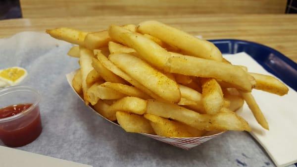 Huge container of fresh regular size fries.