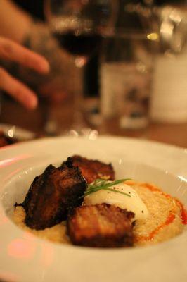 Pork belly with poached egg over grits/cornmeal