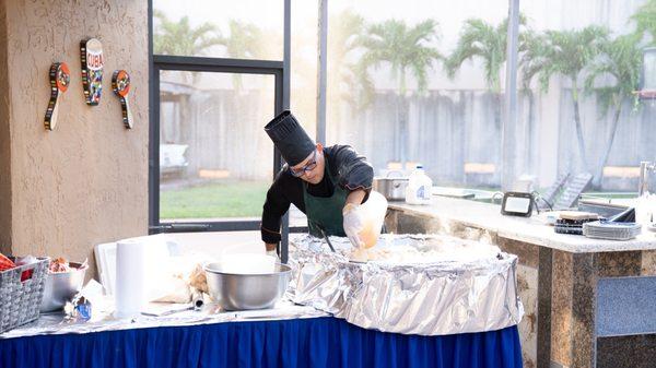 During the event, the chef preparing magic.