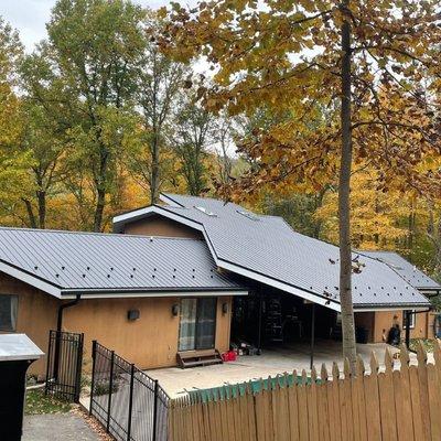 Custom metal roof with character supplied by Ridgetop Roofing