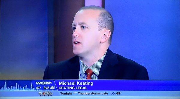 Attorney Michael Keating being interviewed by WGN News about motor vehicle accidents and traffic safety laws.