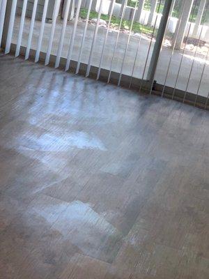 Residue all over floor after three additional cleaning visits before move in