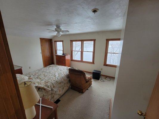 This upstairs bedroom needed to be moved out so the house could be cleaned from fire damage!