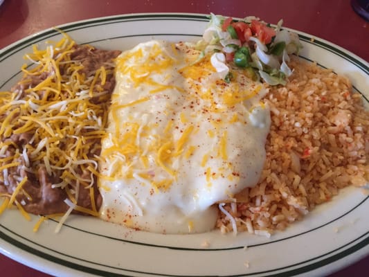 Cheese and sour cream enchiladas.