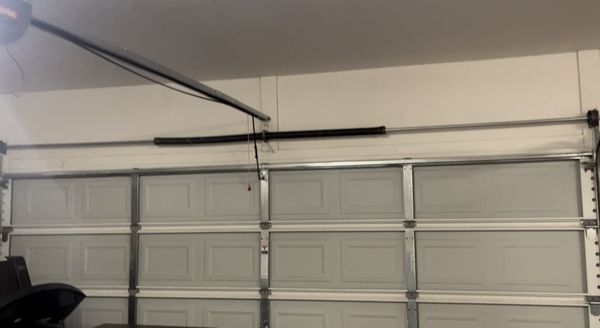 Upgraded garage door springs. Replace damaged one with two new ones.