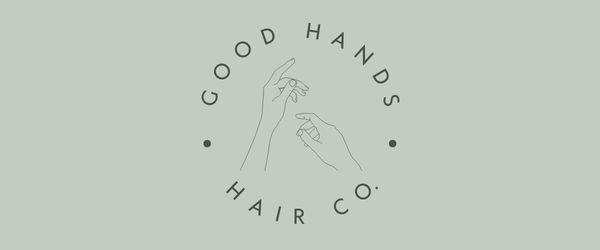 The words "Good Hands Hair Co." typed in a circle. Inside the circle is a drawing of two hands. The picture has a green background.