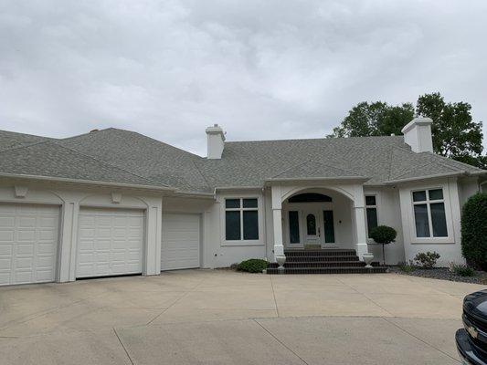 This grand home needed a stucco-style update.