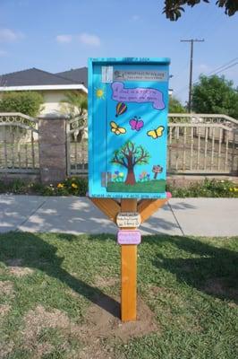 The front of the very first Little Free Library in Azusa!