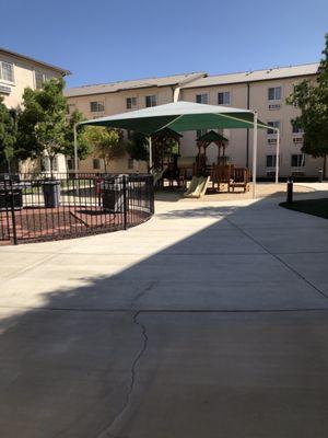 Ground level view of playground in courtyard