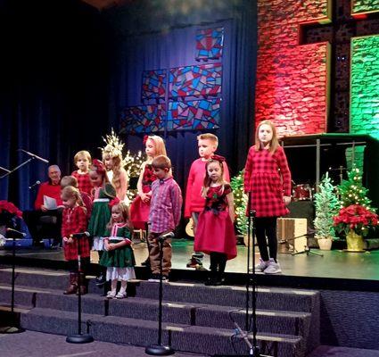 Children's choir performing during the Christmas Eve service