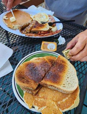 The plate on the bottom is what we took home.   The portions are that BIG!!   You can not eat it all in one sitting!