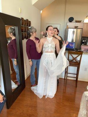 Erin said "Yes to her dress" the dress looks stunning and fits her perfectly. Grandma, mom, and family are so happy for her.