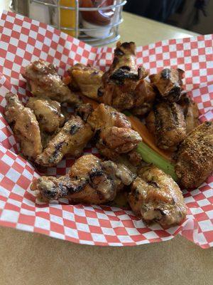 12 Jumbo Grilled Wings  half Garlic Parmesan sauce & half Sweet Cajun dry rub with bleu cheese dressing