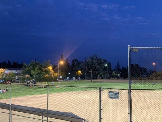 Party in the Park near the baseball diamond.