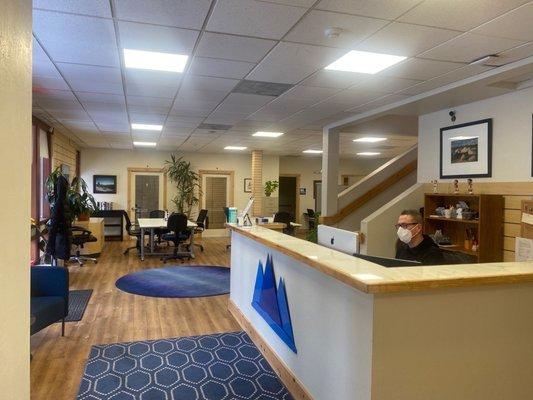 Front desk and open desk work space.