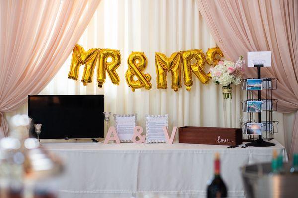 Ivory and blush pipe and drape for my welcome table set up