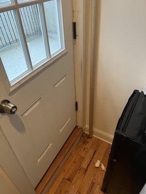 The wood around the door frame had rotted away from water seeping in over a period of time.