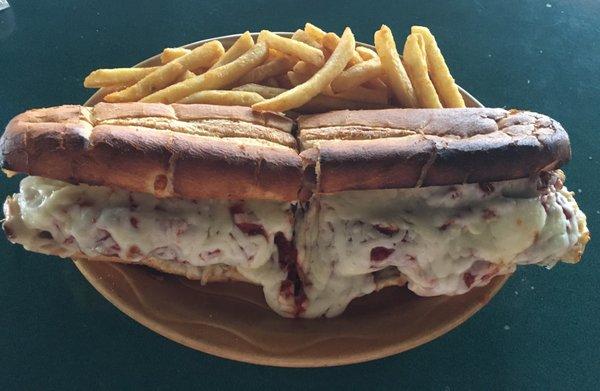 Chicken Parmesan Sandwich-Juicy Chicken Breast encrusted with Parmesan, Thick Red Marina Sauce, Melted Mozzarella Cheese. Hearty Fries!