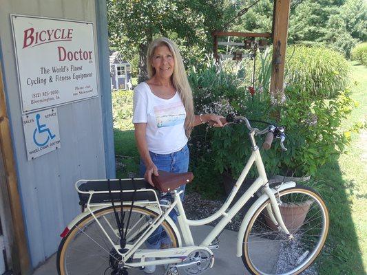 Terry my wife with e-bike at the shop