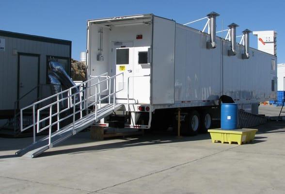 Class 1,000 (ISO 6) towable clean room trailer with temperature and humidity control, process water systems, and generator.