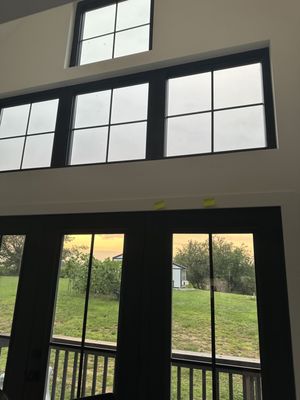 I am giving you these photos to see how beautiful the doors are.  The yellow post it notes show where it is leaking in from.