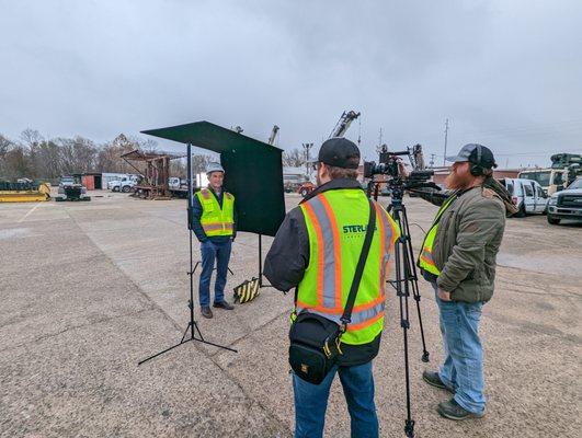 Behind the scenes photo of a rebranding video for Sterling Industrial