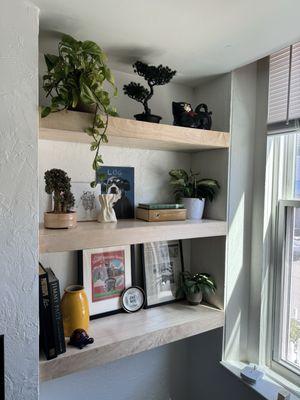 Right side of floating shelves with some Knick knacks