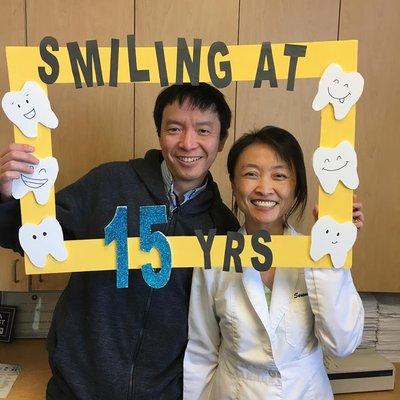 Dr. Hu and Mike celebrating Rengstorff Dental Care's 15 year anniversary.