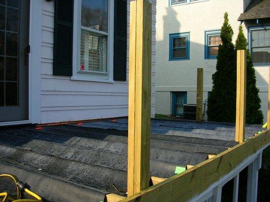 There are many water drainage systems we can use to keep the underside of the deck dry. This one is a practical application using rubber.