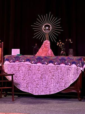 Wooden Christ on the "altar"