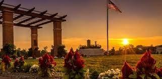 The Gardens at Olive Branch Cemetery during sunset.