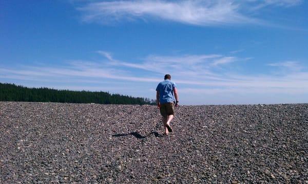 Husband hiking up the berm.