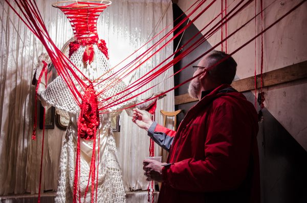 The Martyrdom of Saint Elsewhere, Dorothy Melander-Dayton (Detroit, MI) February 2017. Wedding dress, yarn, ribbons, toys, spray paint