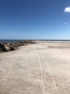 Breakwater wall and beach