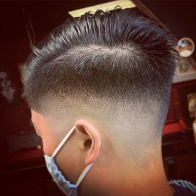 Mid low drop fade by Barber Rene