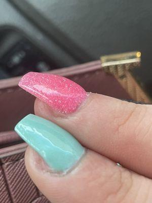 My real nail being exposed after I asked for them to shorten them.