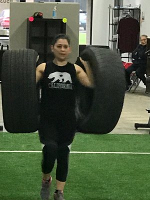 Sandra Playing with some tires.