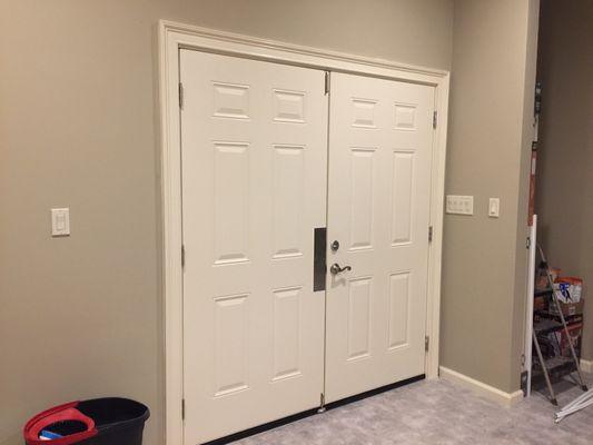 Door, trim and hardware installation & paint.