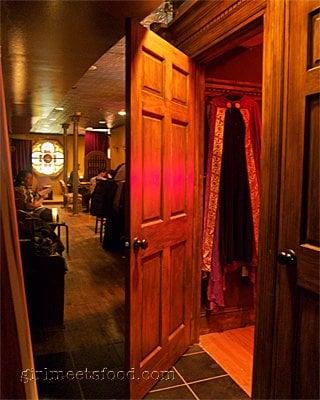 Doorway into the Pastor's Study, complete with robe.