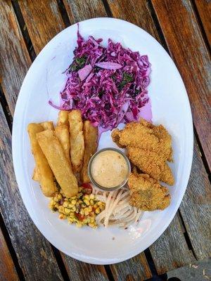 Fish & Chips. Crispy cornmeal crusted local catfish, yuca frits, pickled jicama, chili-lime remoulade. $13.75.