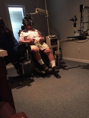 Dad getting eye exam