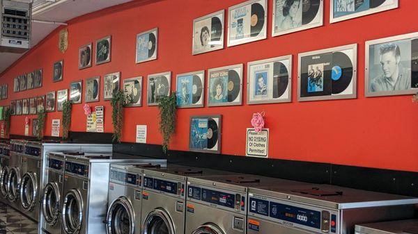 The framed records on the wall is a nice touch and gives you something to look at while you're trying to get the stains out of your clothes.